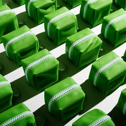 photo of several baby bar duo zipper cases aligned in a grid on a white surface