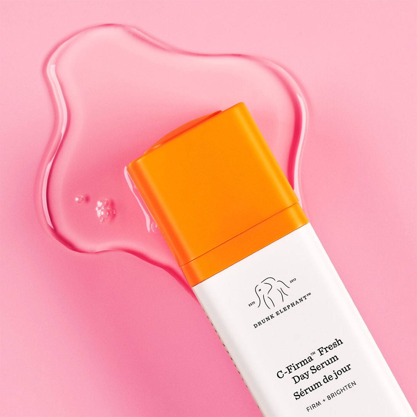 C-firma in a pool of serum on a pink background.