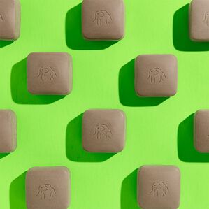 photo of Juju bars arrayed in a grid pattern against a bright green background