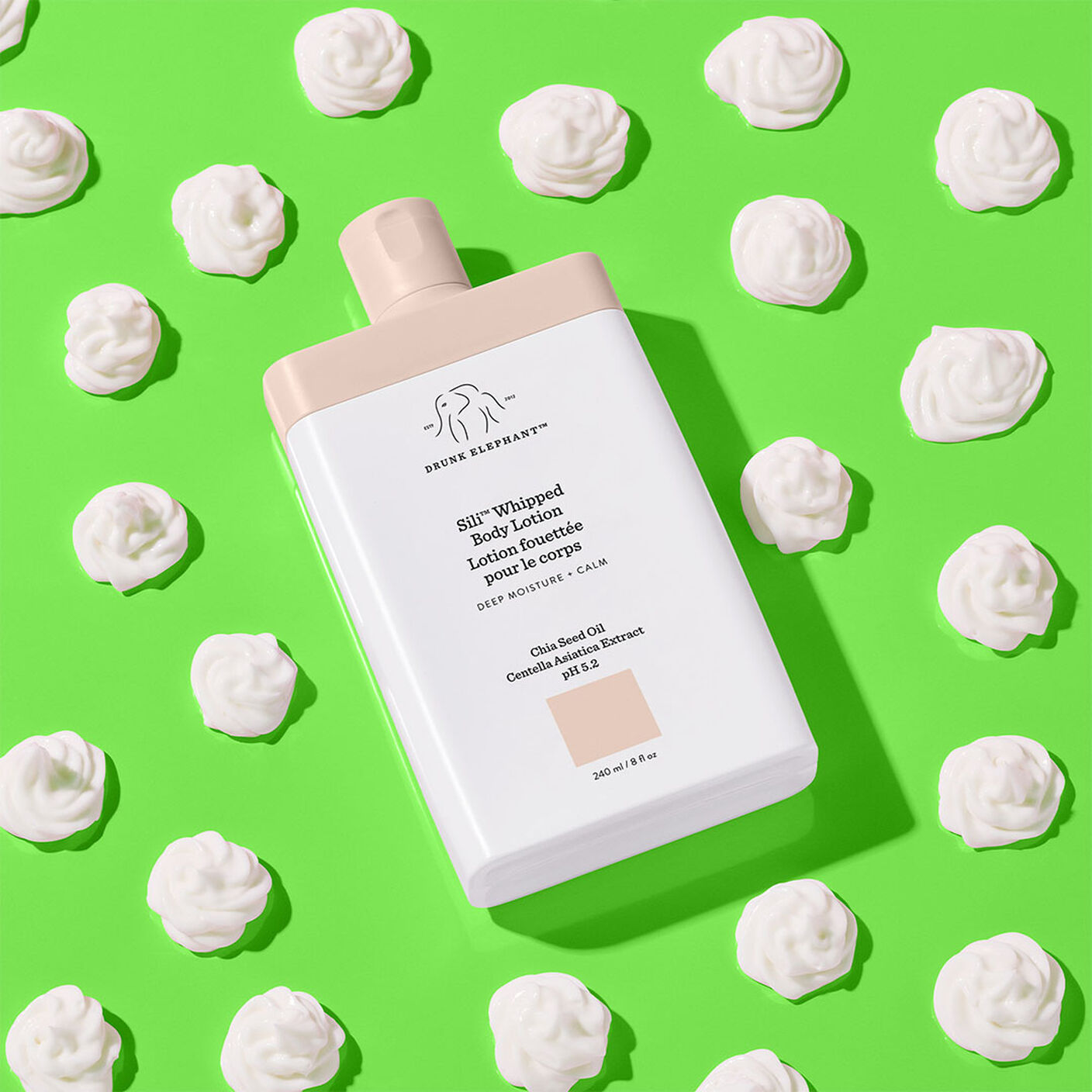Sili Whipped Body Lotion surrounded with dolops of whipped body lotion.