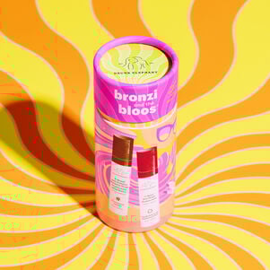 Bronzi and the Bloos cylinder packaging on a yellow and orange swirly designed floor