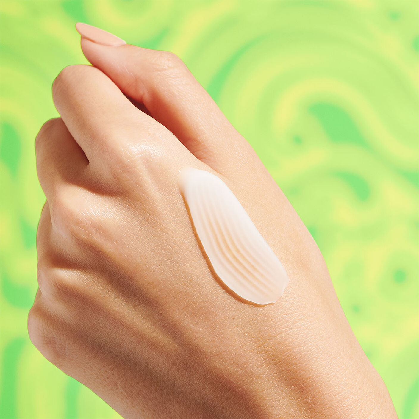 A smear of Protini Cream on top of hand. 