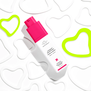 photo of A-Passioni retinol on a white background with white and green acrylic hearts