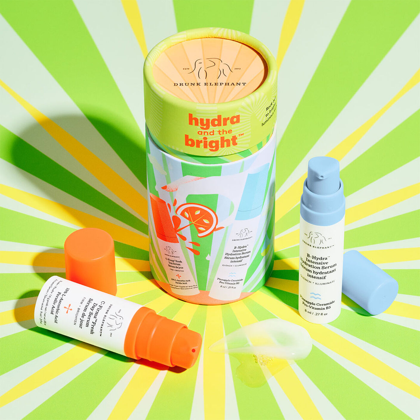 Hydra and the Bright Packaging with C-Firma Fresh and B-Hydra with the caps off and with serums smears aside them. 