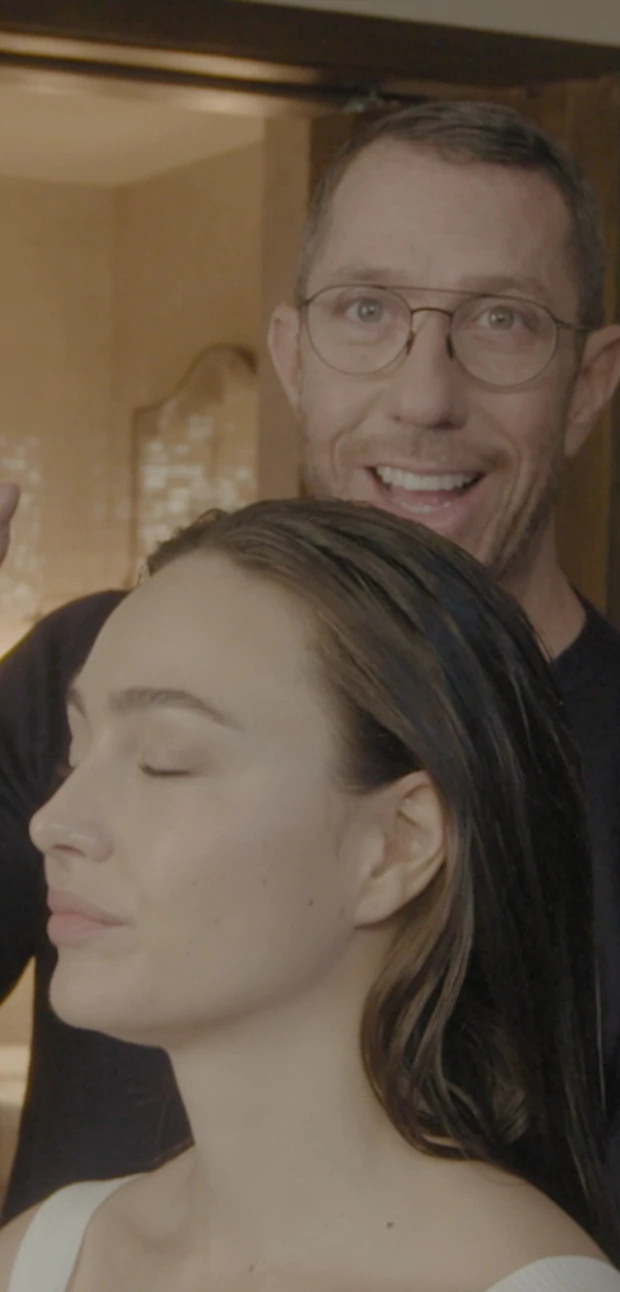 video of celebrity hair stylist Chris McMillan demonstrating scalp scrub on a model