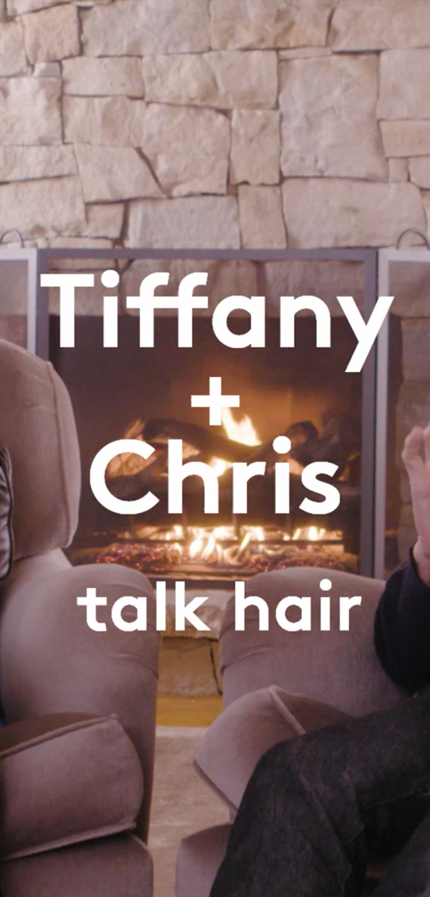 video of Drunk Elephant founder Tiffany Masterson talking to celebrity hairstylist Chris McMillan in front of a cozy fireplace