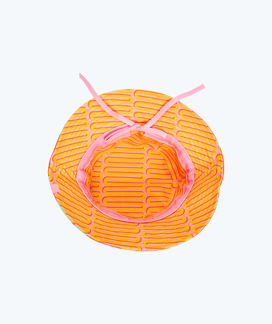 Reversible bucket hat with the pink and orange design.